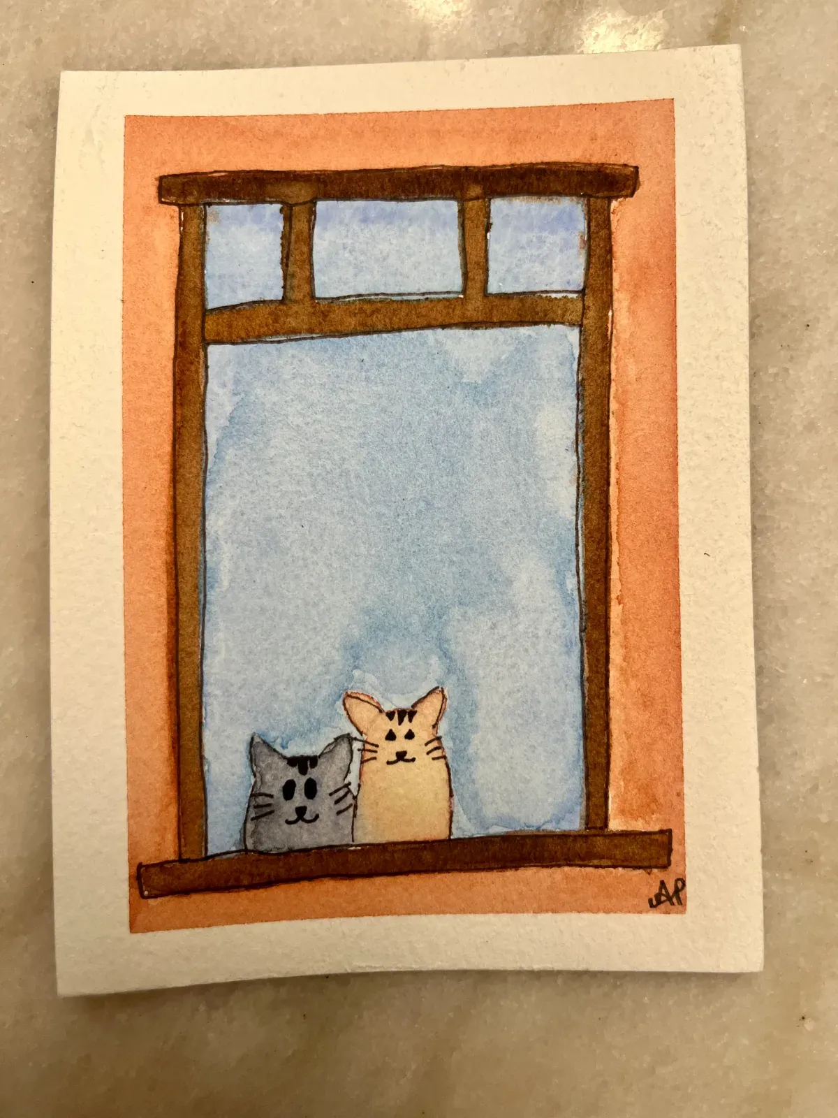 kitten pals in windowsill